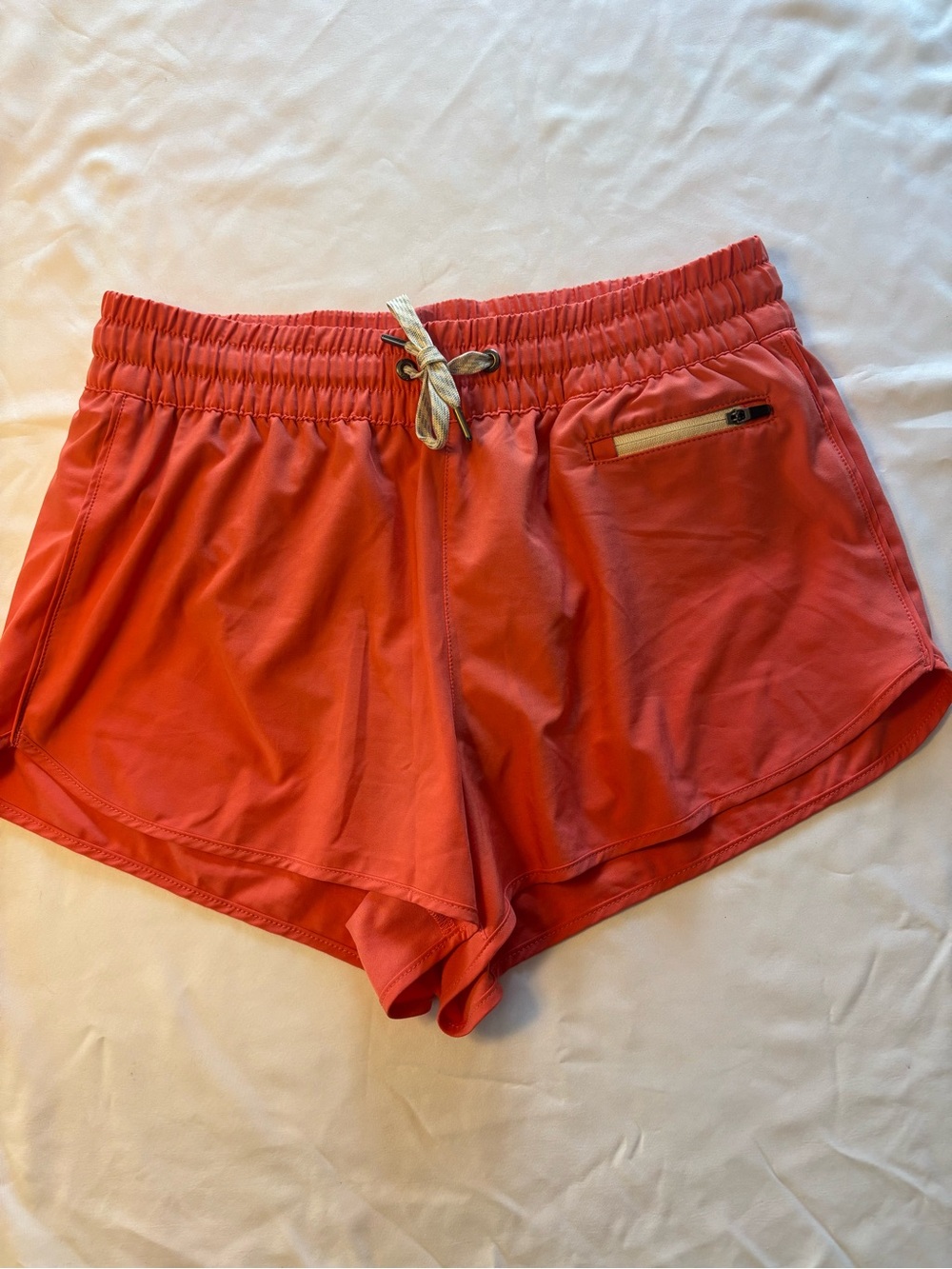 Vuori Coral Clementine Athletic Shorts with Zip Pocket 3”